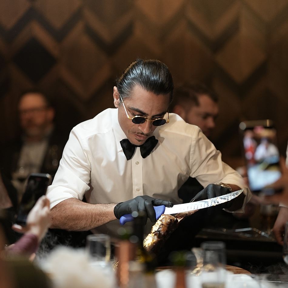 Salt Bae Nusret is makeing a presentation in his Galataport Nusr-et restaurant